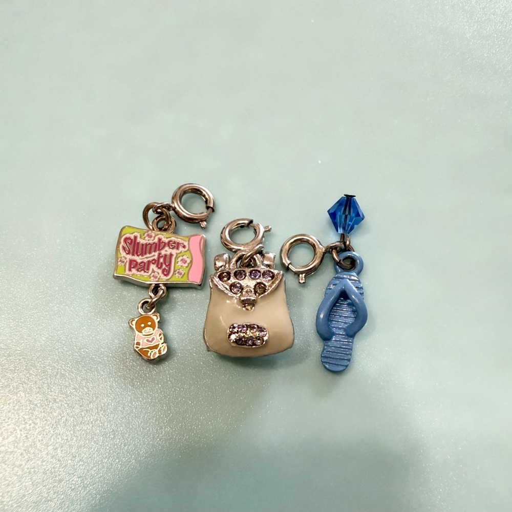 Set of collectible charm bracelet charms - flip flop, slumber party, backpack